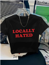 Load image into Gallery viewer, WOMEN'S "LOCALLY HATED" GRAPHIC TEE IN STORES NOW